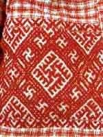 Свастика на фрагменте женской рубахи. Нач. 20 века. Тарногский район